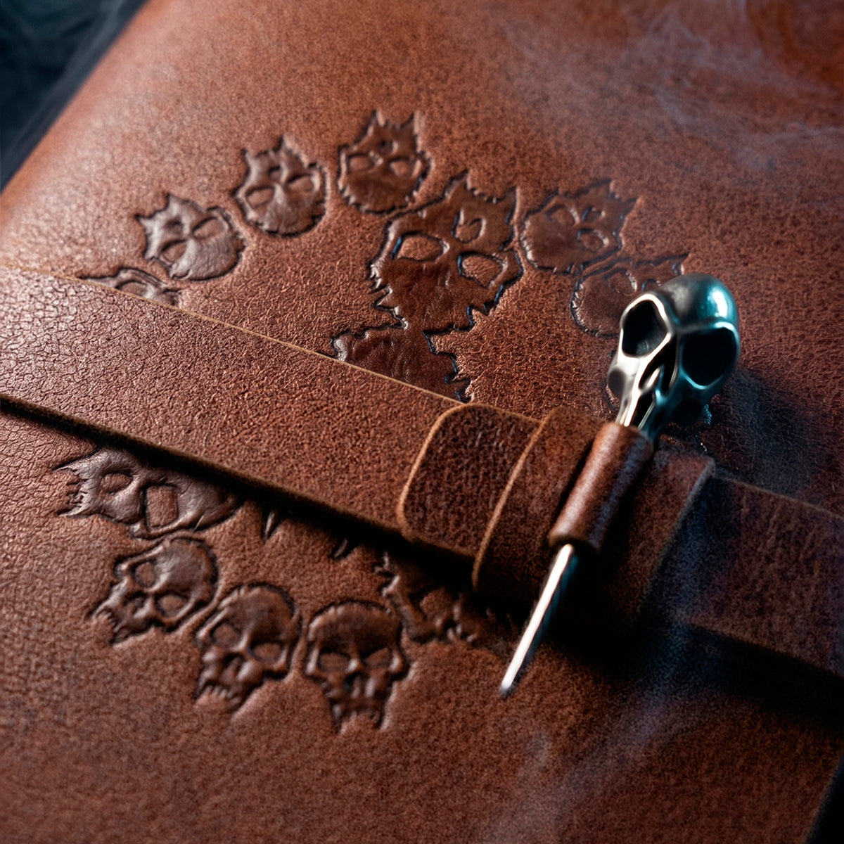 brown leather-bound journal with a strap closure and decorative skull engravement - Book Of Nod Journal World of Darkness Vampire: the Masquerade