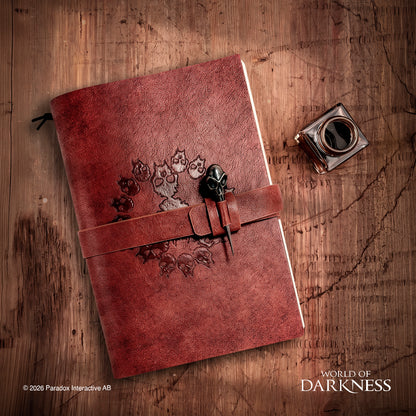brown leather-bound journal with a strap closure and decorative skull engravement - Book Of Nod Journal World of Darkness Vampire: the Masquerade