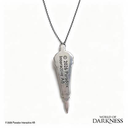 World of Darkness The Embrace Pendant, a limited edition gothic jewelry piece featuring a deep crimson red glass teardrop center set in an ornate silver-toned brass frame, displayed in a black presentation box with red satin lining alongside a numbered Certificate of Authenticity.
